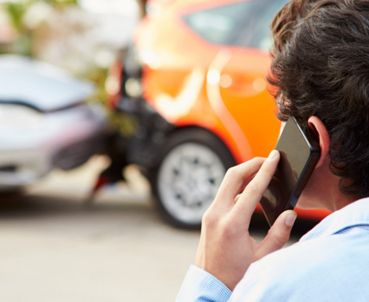 man on phone with insurance agency